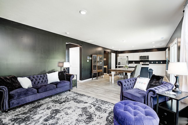 6332 Card Blvd, Indianapolis, IN 46221 - living area with light wood-style flooring and recessed lighting