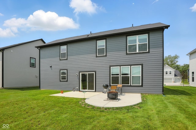 633 Cowley Dr, Westfield, IN 46074 - back of house with a patio, a lawn, and a fire pit