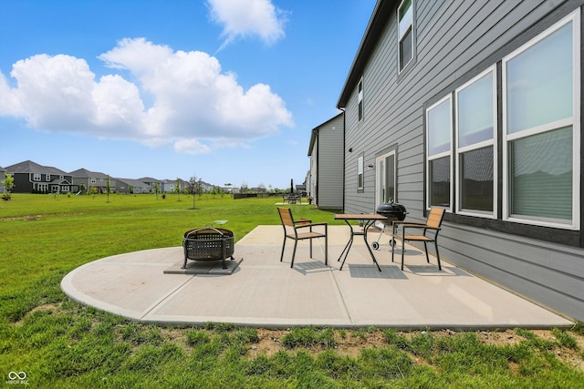 633 Cowley Dr, Westfield, IN 46074 - view of patio with an outdoor fire pit and a residential view