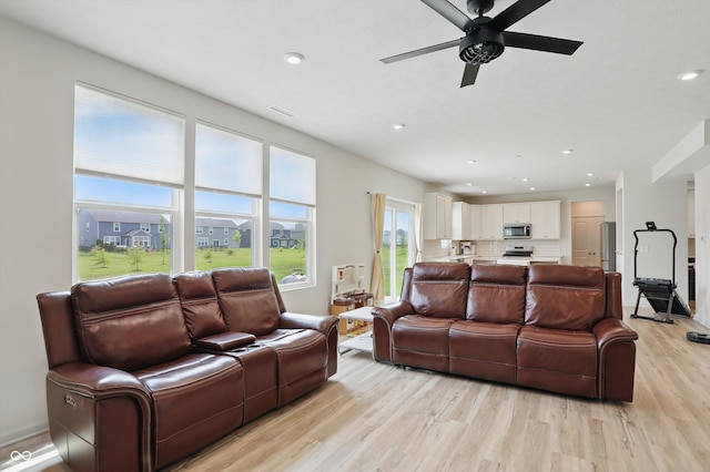 633 Cowley Dr, Westfield, IN 46074 - living room featuring light wood-type flooring, ceiling fan, and recessed lighting