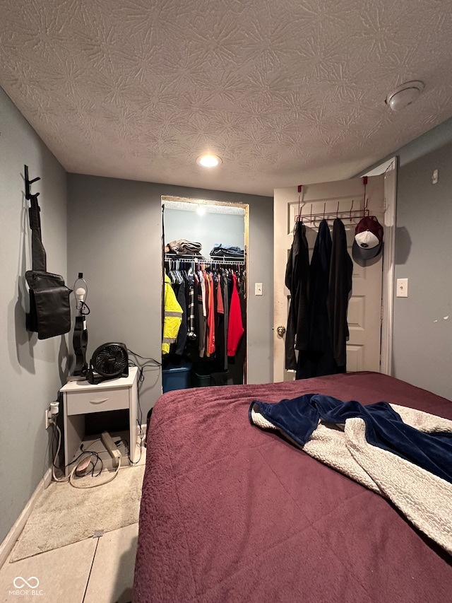 1728 N Somerset Ave, Indianapolis, IN 46222 - bedroom featuring a walk in closet, a closet, and recessed lighting