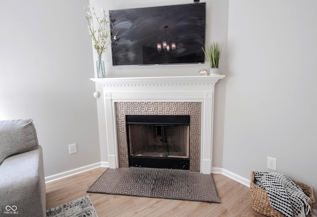 13829 Black Canyon Ct, Fishers, IN 46038 - detailed view of wood finished floors and a fireplace