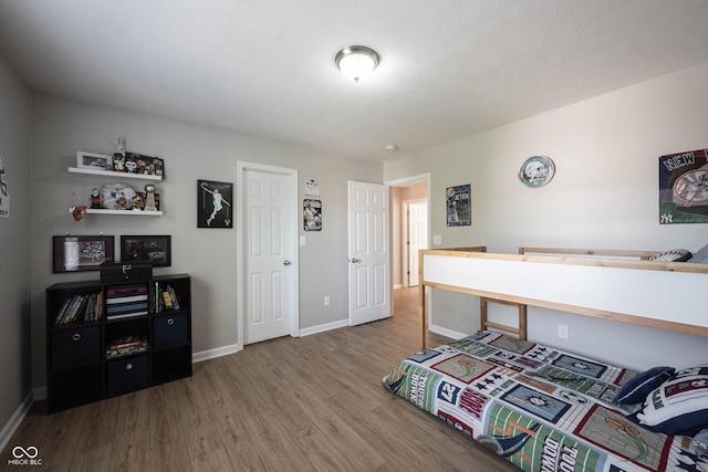 13829 Black Canyon Ct, Fishers, IN 46038 - bedroom with wood finished floors and baseboards