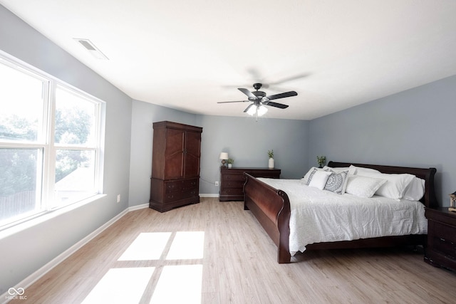 13829 Black Canyon Ct, Fishers, IN 46038 - bedroom with light wood-type flooring and a ceiling fan