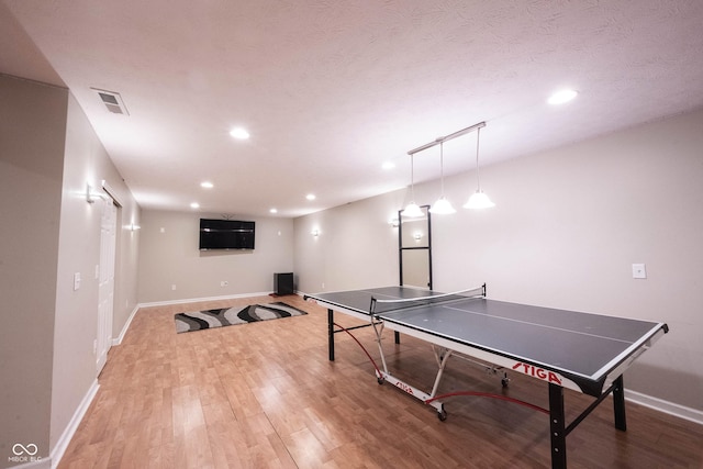 13829 Black Canyon Ct, Fishers, IN 46038 - rec room featuring light wood-style flooring and recessed lighting