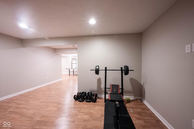 13829 Black Canyon Ct, Fishers, IN 46038 - workout area featuring light wood-type flooring and recessed lighting