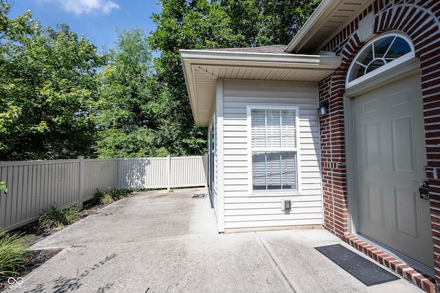 6586 Quail Run, Fishers, IN 46038 - property entrance featuring a patio and brick siding