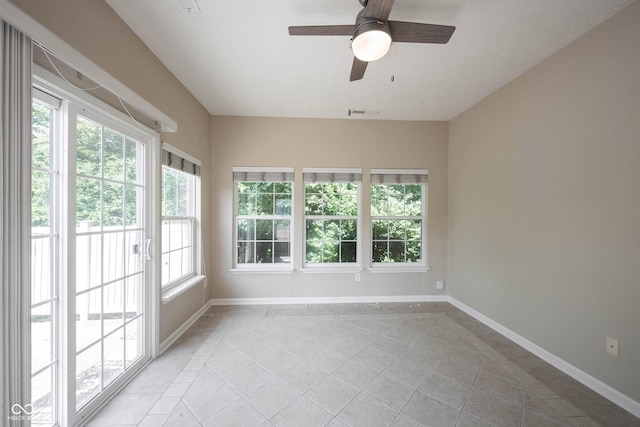 6586 Quail Run, Fishers, IN 46038 - unfurnished sunroom with tile patterned floors and inlaid floor details
