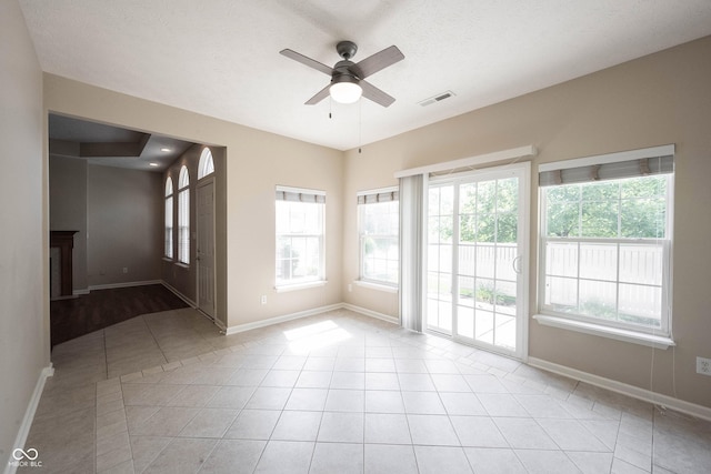 6586 Quail Run, Fishers, IN 46038 - spare room with ceiling fan and light tile patterned floors