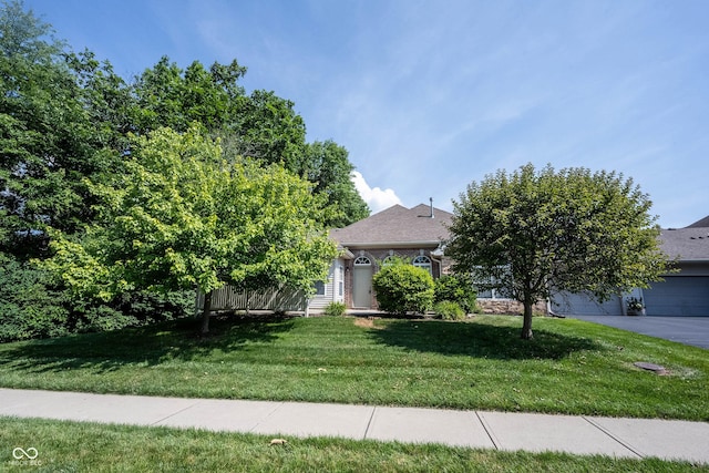 6586 Quail Run, Fishers, IN 46038 - obstructed view of property featuring a front yard and a shingled roof