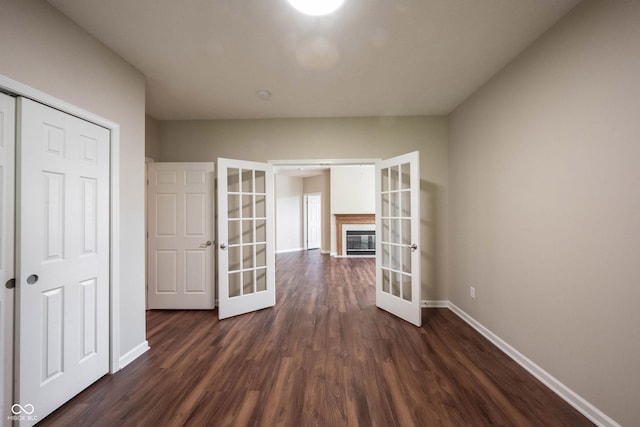 6586 Quail Run, Fishers, IN 46038 - unfurnished room featuring french doors and dark wood-style flooring