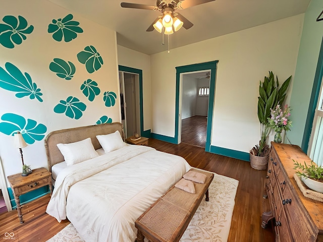 140 N Sycamore St, Dana, IN 47847 - bedroom with dark wood-style flooring and ceiling fan