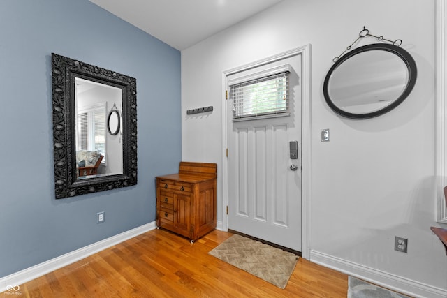 932 N Broadway St Unit 4, Indianapolis, IN 46202 - entryway with light wood-style floors and baseboards