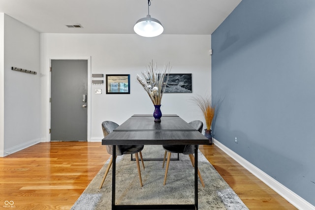 932 N Broadway St Unit 4, Indianapolis, IN 46202 - dining room with light wood finished floors and baseboards