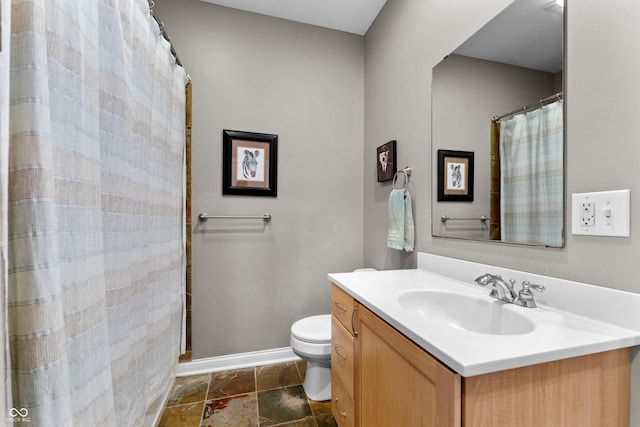 932 N Broadway St Unit 4, Indianapolis, IN 46202 - full bath with vanity, stone tile flooring, and a shower with curtain