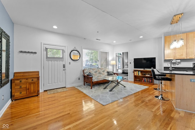 932 N Broadway St Unit 4, Indianapolis, IN 46202 - living area with light wood-style floors and recessed lighting