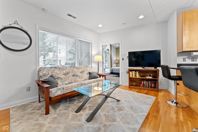 932 N Broadway St Unit 4, Indianapolis, IN 46202 - living room featuring light wood-style flooring and recessed lighting