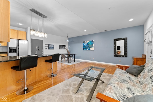 932 N Broadway St Unit 4, Indianapolis, IN 46202 - living room with recessed lighting and light wood-type flooring
