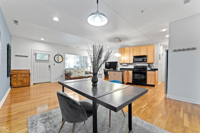 932 N Broadway St Unit 4, Indianapolis, IN 46202 - dining room featuring light wood-style floors and recessed lighting