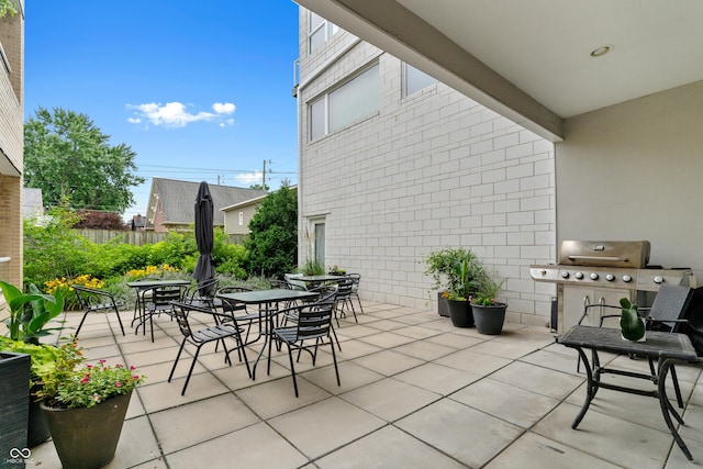 932 N Broadway St Unit 4, Indianapolis, IN 46202 - view of patio featuring grilling area and outdoor dining area