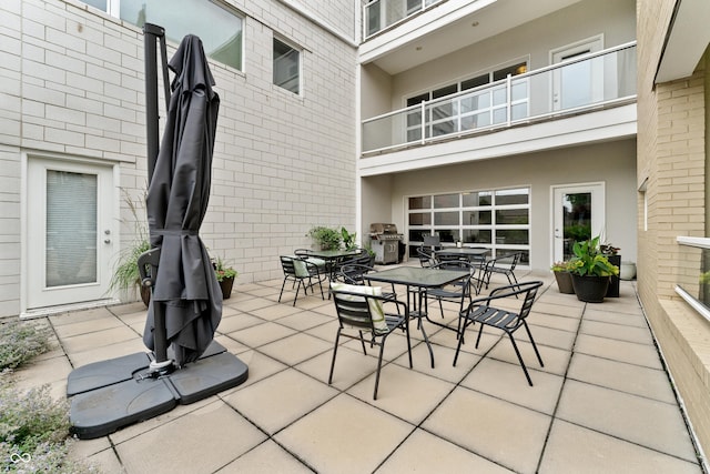 932 N Broadway St Unit 4, Indianapolis, IN 46202 - patio / terrace featuring outdoor dining space, a grill, and a patio
