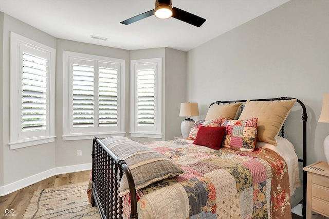 906 Berkhamsted Ln, Carmel, IN 46032 - bedroom featuring wood finished floors and ceiling fan
