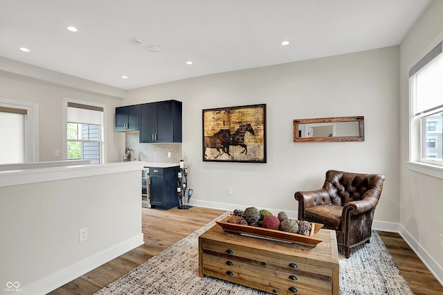906 Berkhamsted Ln, Carmel, IN 46032 - living room with healthy amount of natural light, light wood-type flooring, and recessed lighting