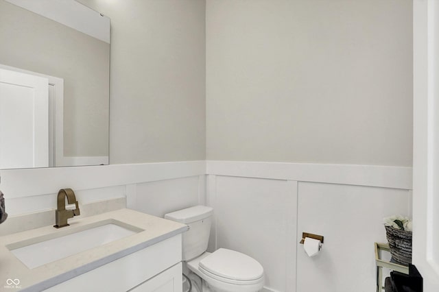 906 Berkhamsted Ln, Carmel, IN 46032 - bathroom featuring vanity and wainscoting