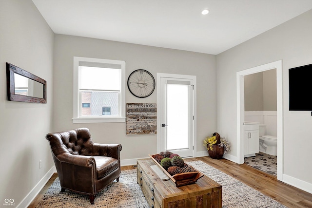906 Berkhamsted Ln, Carmel, IN 46032 - living area with wood finished floors and recessed lighting