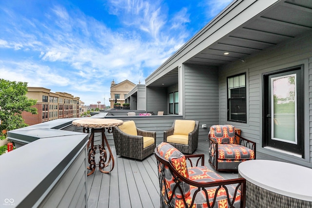 906 Berkhamsted Ln, Carmel, IN 46032 - wooden terrace with outdoor lounge area