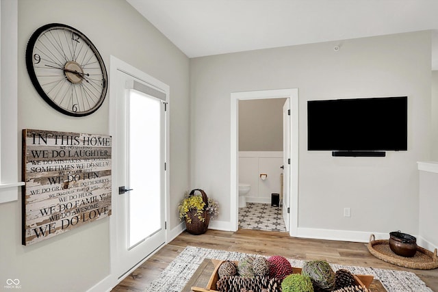 906 Berkhamsted Ln, Carmel, IN 46032 - living room featuring light wood-style floors and baseboards