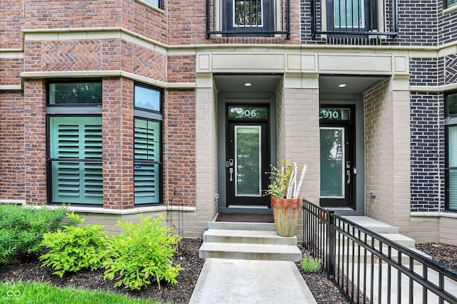 906 Berkhamsted Ln, Carmel, IN 46032 - view of exterior entry featuring brick siding