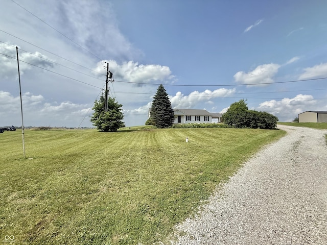 1687 Killion Ave, Seymour, IN 47274 - view of green lawn with gravel driveway