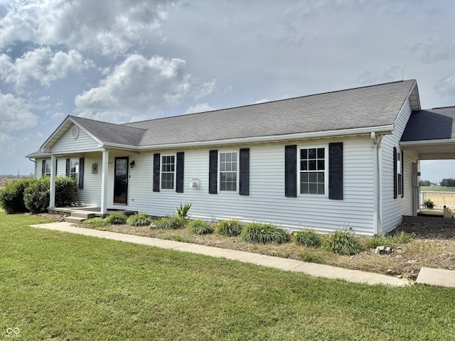 1687 Killion Ave, Seymour, IN 47274 - single story home featuring a shingled roof, a front yard, and covered porch