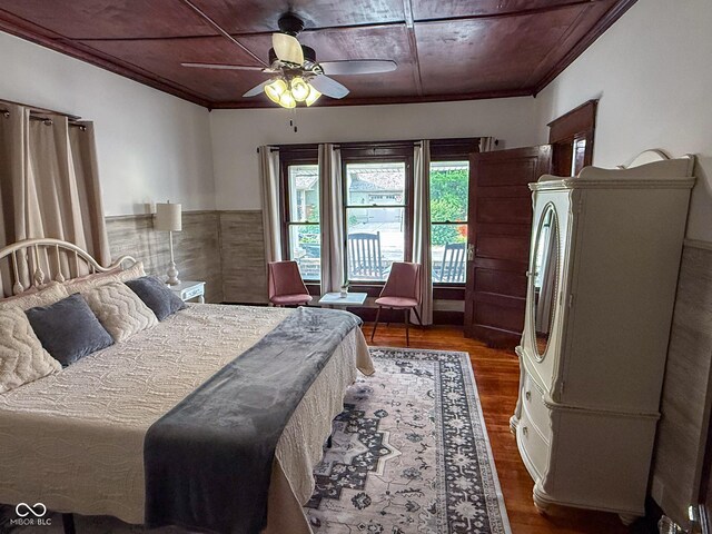 251 N St, Danville, IN 46122 - bedroom with wood finished floors, ornamental molding, and ceiling fan