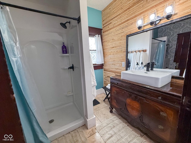 251 N St, Danville, IN 46122 - bathroom featuring curtained shower, wooden walls, and vanity