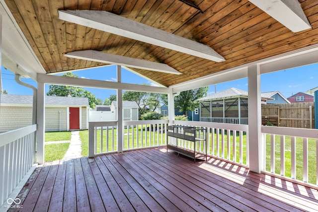 917 W Busby St, Lebanon, IN 46052 - wooden deck with a storage shed, a sunroom, and a residential view