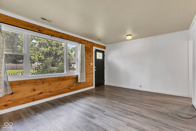 917 W Busby St, Lebanon, IN 46052 - entrance foyer with wood finished floors and wooden walls