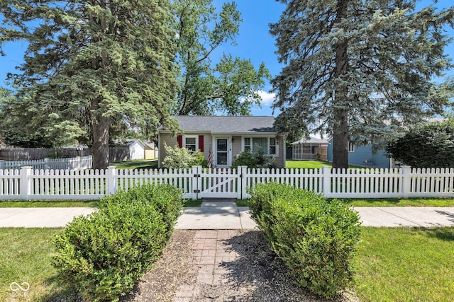 917 W Busby St, Lebanon, IN 46052 - ranch-style home with a fenced front yard and a gate