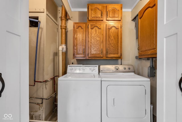 917 W Busby St, Lebanon, IN 46052 - laundry area with cabinet space and washing machine and clothes dryer