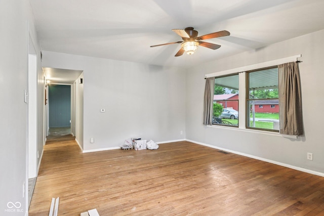3921 S Lasalle St, Indianapolis, IN 46237 - unfurnished room featuring a ceiling fan and light wood-style floors