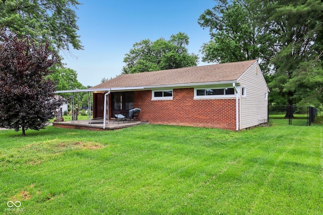 3921 S Lasalle St, Indianapolis, IN 46237 - rear view of property with a patio area and brick siding