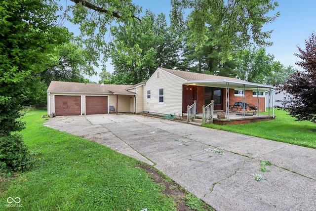 3921 S Lasalle St, Indianapolis, IN 46237 - ranch-style house featuring a garage, driveway, covered porch, and a front yard