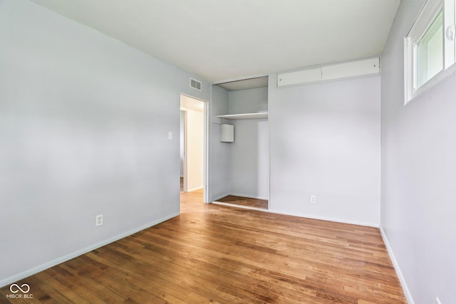 3921 S Lasalle St, Indianapolis, IN 46237 - unfurnished bedroom featuring hardwood / wood-style flooring and baseboards