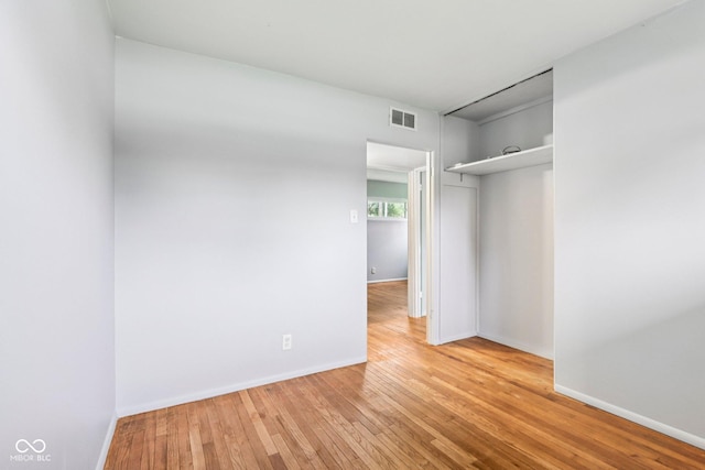 3921 S Lasalle St, Indianapolis, IN 46237 - unfurnished bedroom with hardwood / wood-style flooring and a closet