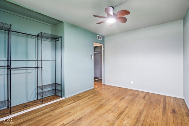 3921 S Lasalle St, Indianapolis, IN 46237 - unfurnished bedroom with hardwood / wood-style flooring and ceiling fan