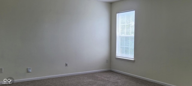 403 Bagley Ln, Indianapolis, IN 46231 - carpeted empty room with plenty of natural light