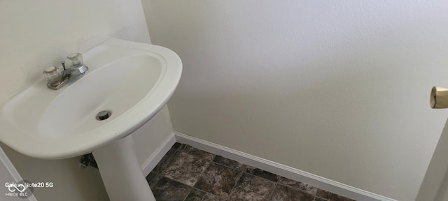 403 Bagley Ln, Indianapolis, IN 46231 - bathroom featuring baseboards