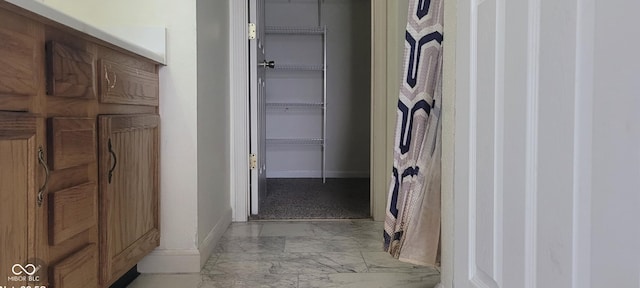 403 Bagley Ln, Indianapolis, IN 46231 - hall with baseboards and light marble finish floors
