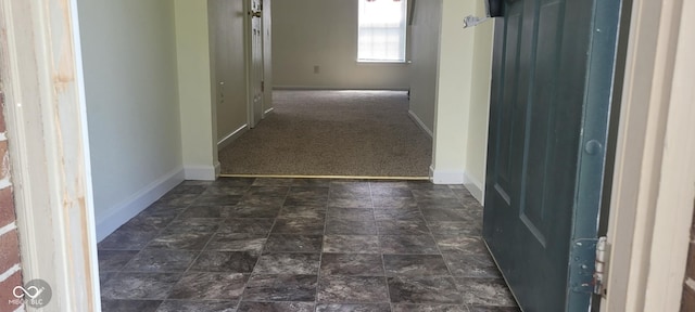 403 Bagley Ln, Indianapolis, IN 46231 - hall with baseboards and dark colored carpet